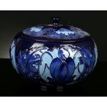 A Kerry Goodwin Moorcroft lidded pot, stamped and signed under, (14cm diam).