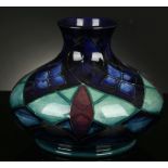 A Moorcroft Lattice blue glazed squat shaped vase by Sally Tuffin, the base impressed Moorcroft