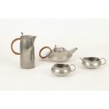 Archibald Knox for Liberty & Co., a pewter four piece tea set, consisting of a tea pot, hot water