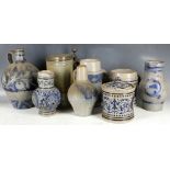 A collection of 19th century and later Westerworld type German saltglaze items to include jugs,