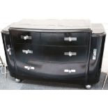 An Art Deco style black painted dressing table with three drawers and chrome handles, together