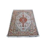 Persian Tabriz rug, late 20th Century, 1.45m x 0.99m Condition Rating B