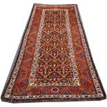 Kurdish rug, North-West Iran, mid 20th Century, 2.30m x 1.05m Condition Rating C