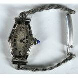 A ladies Art Deco hexagonal form white metal wristwatch, the rim set with sapphires and diamonds,