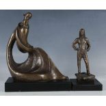 A modern design bronze sculpture of a mother holding a child, 21.5cms high, together with another