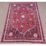 A fine vintage Persian hand made Qashqai carpet, 292 x 207cm.