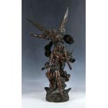 Patinated bronzed study of an angel protecting a young man with sword c.1920, 58cm high
