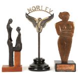 Copper statue of a nude, signed Glust, issued as a fashion award, 26cms., Morley winged tyre