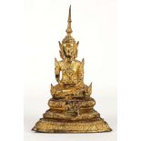 A THAI GILT BRONZE SEATED BUDDHA. 
Raised on a stepped plinth, 27cm H.