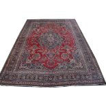 Persian Meshed carpet, 3.89m x 3.05m Condition Rating C