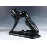 A 20th century plaster based model of female nude in Art Deco manner painted in black