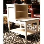 A pair of French white painted bedside tables with superstructure having open shelves over an