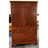 An Edwardian inlaid mahogany linen press, double doors, concealed shelving, set over two drawers,