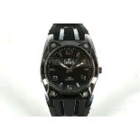 A Dumont gents fashion watch, stainless steel case, black face with stainless hands, numbers etc,