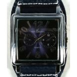 A square faced fashion watch, chrome, black face, chrome numerals and hands, supplied with spare