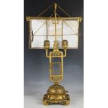 A 19th century French chinoiserie gilt bronze twin branch table lamp, designed into typical