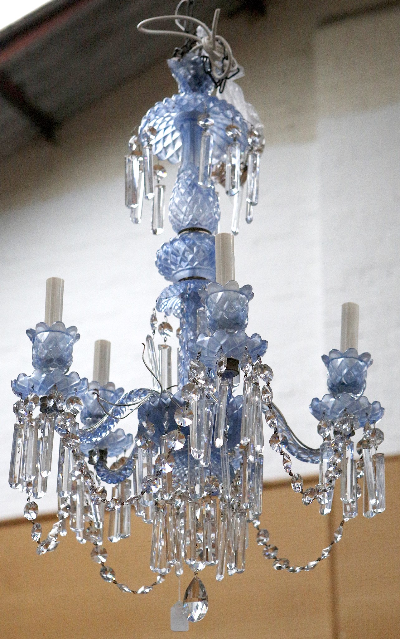 A blue glass five branch chandelier