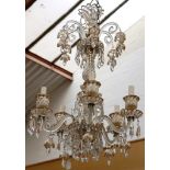 A good Murano glass five branch chandelier with gilt enrichment, mounted around a baluster stem hung