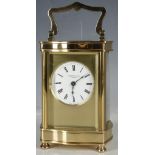 Brass four glass carriage clock in serpentine case, Roman numerals, Horton & Son dial, Henley