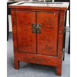 An antique Chinese red lacquered cabinet with gilt enrichments, 66 x 87 x 42cm