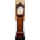 An 18th century flame mahogany long case 8 day clock by Samuel Cox of London 1740, brass face,