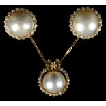 A pair of pearl and diamond earrings in 18ct yellow gold, with pendant (3)