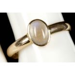 A 14ct gold ring set with single moonstone