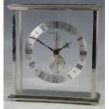 A Jaegaer Lecoultre mystery clock, with eight day movement, lever escapement and silvered chapter