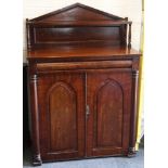 An early Victorian rosewood chiffonier with 2 gothic influence doors beneath single drawer, shaped