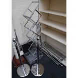 A portable display stand in case and a quantity of barrier poles