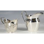 Two hallmarked silver cream jugs, one London 1907, the second, Birmingham 1897, repousee design (2)