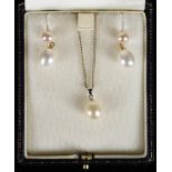 A pair of 18ct gold set of pearl teardrop earrings, sold together with a matching pendant on a