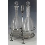 A pair of 19th century Venetian wine decanters and stoppers, having silver plated stand by Edward of