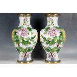 A pair of Chinese cloisonné baluster form vases with peony decoration, 31.5cm high (2)