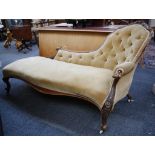 A Victorian carved walnut framed and velvet upholstered chaise longue, one end with buttoned spoon