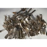 A miscellaneous collection of early 20th century silver plated flatware, comprising various forks,