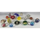 A selection of various 34 decorative table paperweights to include millefiori examples, Caithness '