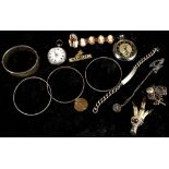 A selection of hallmarked and sterling silver jewellery to include bangles, Italian cameo