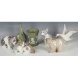 A collection of 6 Lladro porcelain animals to include a Basset Hound, Polar bear, two cats and a