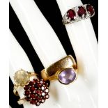 A collection of 5 ladies rings to include a 9ct garnet cluster, a yellow metal single citrine, a