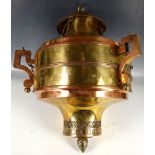 An early 20th century Middle East brass and copper hanging incense burner