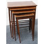 A quartet of four 'nesting' rectangular occasional table, cross banded with satinwood and with