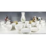 A Royal Crown Derby tea service in white having settings for 11 people, sold together with a Meissen