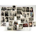 A collection of pop related collector photo cards, including The Beatles, The Applejacks,