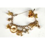 A good 9ct gold charm bracelet, having 14 novelty charms in the shape of a Mexican hat, 3 wise