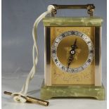 A modern Elliott mantle clock, gilt metal dial with green onyx top and bottom, 15cm high