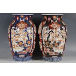 A pair of Japanese Imari vases, 25cm high