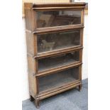 A globe Wernicke style oak stacking bookcase, glazed sliding doors 86,5cm wide (4 sections)