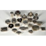 21 Various .925 silver pill pots, including various shapes and some surmounted with garnets, figures