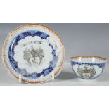 A Chinese mid 18th century armorial cup and saucer, with cobalt blue underglaze decoration and the